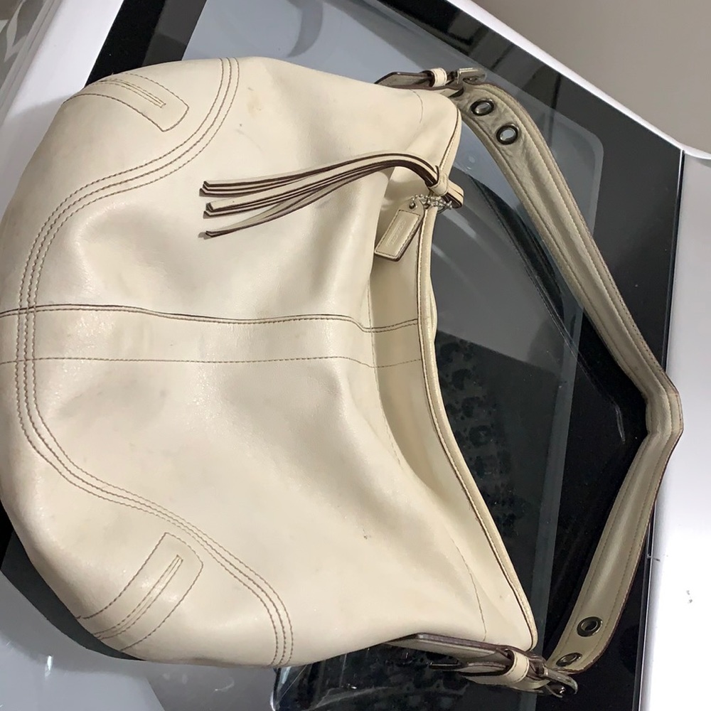 Creamy white coach leather bag